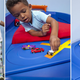 Illustration for article titled This Race Car Bed Is a Giant Extension Of Your Kids Hot Wheels Tracks